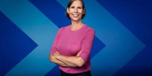 Dr. Megan Levings against a blue background with chevrons