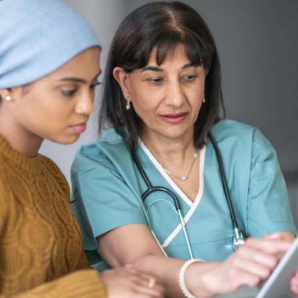 two women in a clinical setting